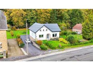 Charmante et spacieuse maison 4 façades avec garage et jardi