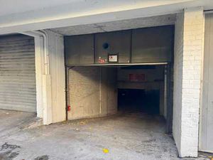 Garage fermé de ± 30 m²