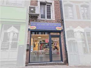 Maison de commerce avec bail en cours au centre de Huy