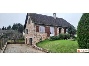 Maison en pierres avec jardin