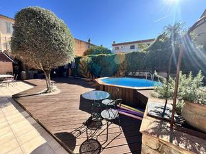 Appartement en rez-de-jardin avec piscine