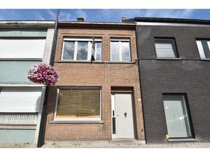 Centraal gelegen woning met tuin  garage en veel potentieel