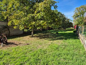 Terrain de 1200m2 avec local commerciale de 150m2