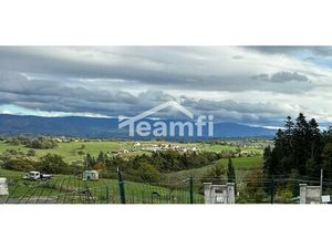 Maison de plain-pied avec jardin et garage