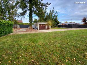 Magnifique terrain clos avec garage