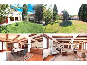 Grande maison familiale avec jardin arboré et garage