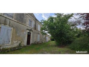 Propriété avec maison et terrain à batir