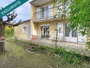 Maison R+1 avec double garage et jardin