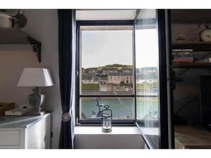 Un immeuble de 2 appartements face au port