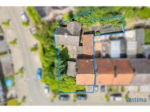 Bouwgrond met aanpalende gezinswoning nabij centrum Aalst