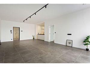 Nieuwbouw gelijkvloers appartement met tuin en garagebox