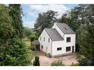 Achterliggende gezinswoning op rustgevend perceel