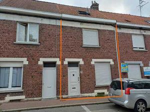 Maison mitoyenne à rénover  avec jardin