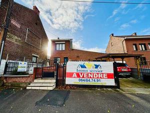 Maison 3 façades avec garage