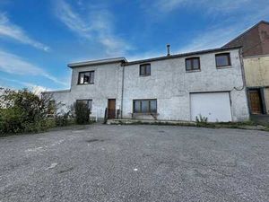 Spacieuse maison avec garage et jardin