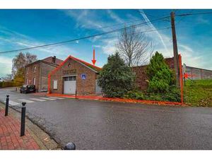 Vaste garage + terrain à lotir