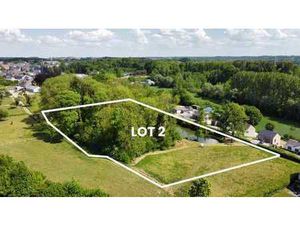 Terrain 1 ha avec étang et bois à vendre à Florennes