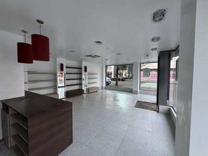 Propriété commerciale unique (55 m²) avec un emplacement d'a