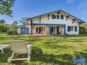 Maison traditionnelle – 5 chambres – Garage – Terrain arbo