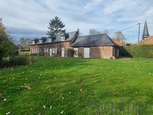 Maison ancienne avec cachet  grand terrain arboré