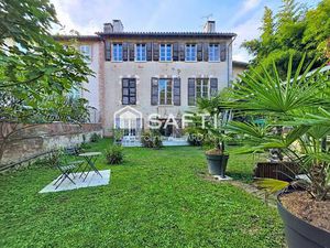 Demeure avec jardin en plein coeur du village