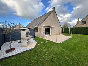 Pavillon individuel semi plain pied  jardin et garages