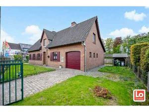 Degelijke alleenstaande woning met inpandige garage geleg...