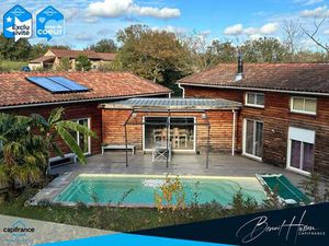 Maison T5 en bois avec piscine sur terrain arboré de 5804m²