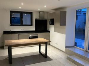 T3 rez chaussée terasse+ 2 places de parking