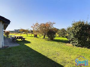 Sur 560m2 de terrain face à la nature  maison T2 de 62m² sur