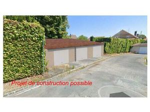 Terrain en hyper centre avec P.C accordé pour construire 3 garages de plus de 25m2 chacun