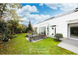 Maison d'architecte et son jardin paysager en centre ville