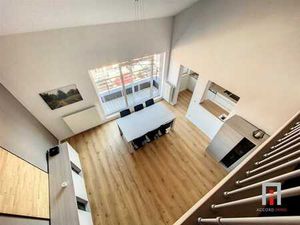Duplex 2 chambres avec parking et cave au centre de Waremme