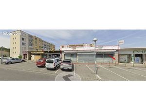 Murs commerciaux loués – >200 m² avec parking  chambre froide et boucherie – excellent emp