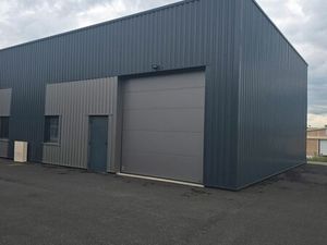 Local professionnel 100 m² – Atelier / Stockage – Zone artisanale – Accès RN88