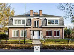 Opbrengsteigendom met 4 appartementen en 2 dubbele garage...