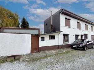 Maison 3 façades avec garage