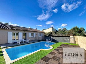 A vendre maison 5 pièces de plain pied de 125 m² avec garage et piscine sur terrain de 560