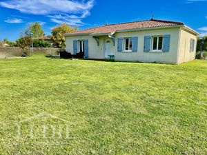 Maison de plain-pied avec garage - terrain 1000m²