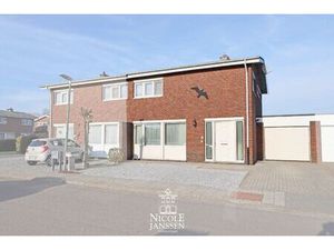 Halfopen gezinswoning met 4 slaapkamers  garage en tuintje