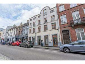 IMMEUBLE MIXTE AVEC REZ COMMERCIAL ET 3 APPART. AU CENTRE