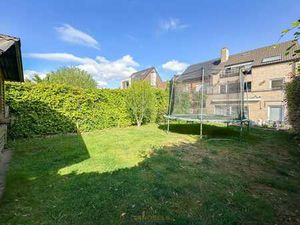 Te koop  opbrengsteigendom met 3 appartementen en garages...