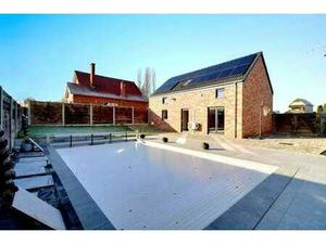 Villa 4 façades avec piscine – PEB A+ – 3 chambres