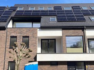 Energiezuinig nieuwbouw duplexappartement met zonnig terras in het hart van Beervelde.