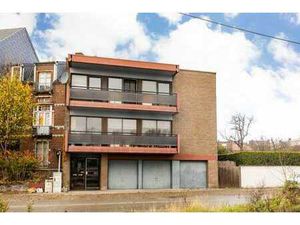 Immmeuble 2 appartments 3 chambres  3 garages (dt 1 double)