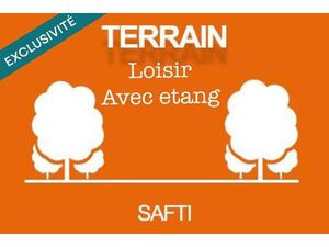 Terrain de loisir avec étang