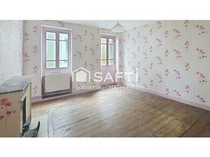 Maison de ville à rénover avec beau potentiel