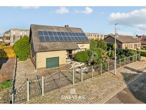 Ruime  te renoveren woning op 7a60 in centrum-Zonhoven