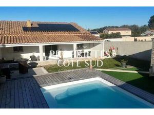 Maison de plain-pied 93 m2 sur terrain 512 m2 avec piscine et garage