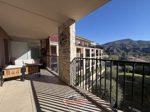 Superbe 2 pièces avec vaste terrasse et parking en sous-sol